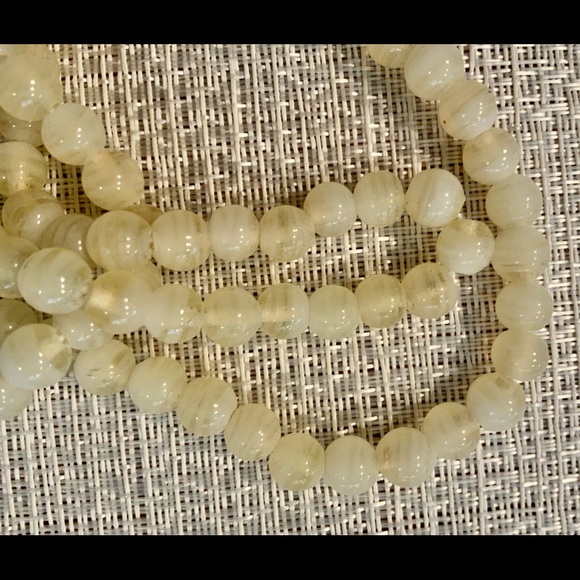 Vintage 100 pressed “milk glass” beads/W. Germany